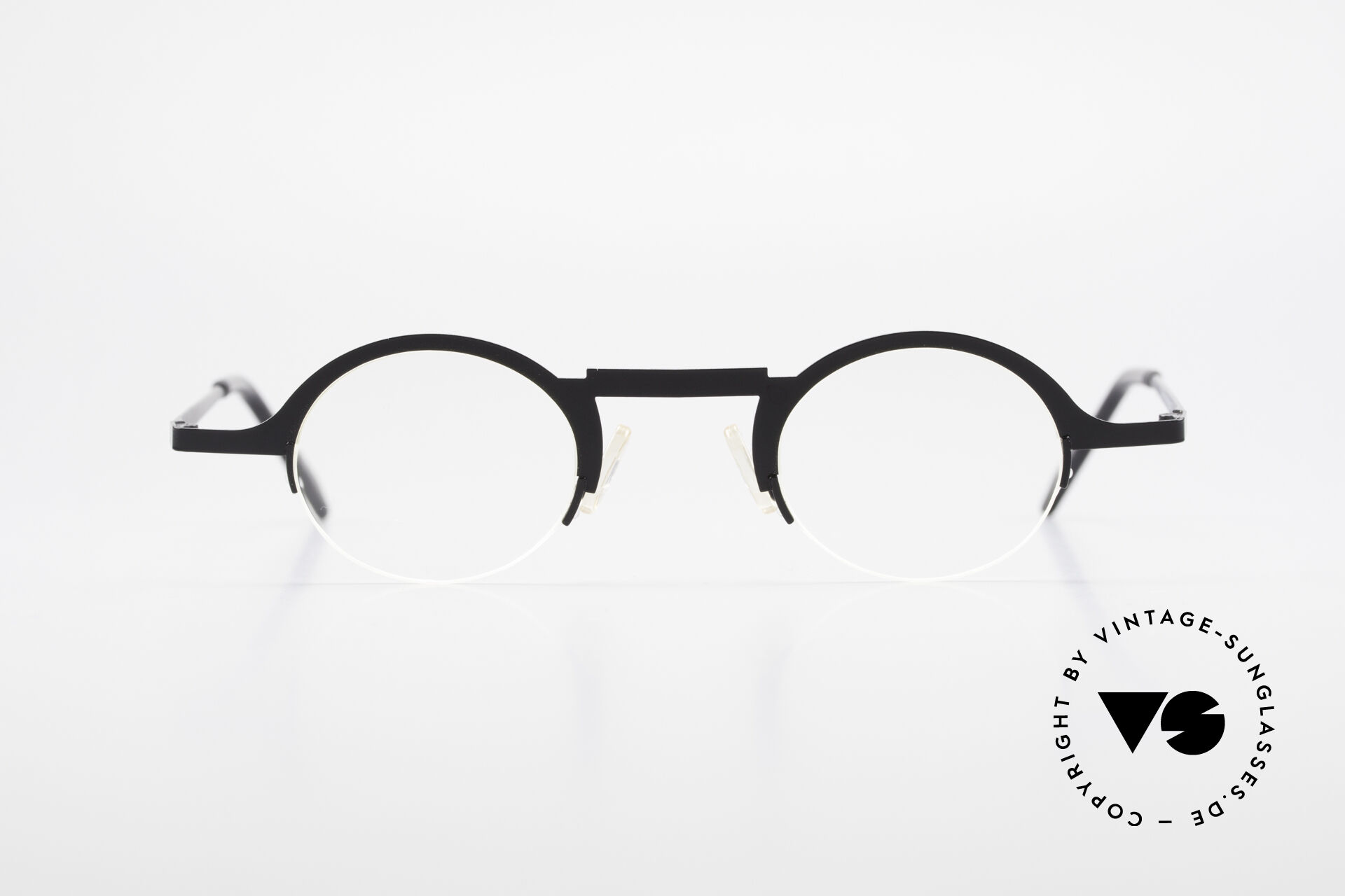https://www.vintage-sunglasses-shop.com/media/products6/full/16435_31896_Theo-Belgium-Triptrio_Round-Designer-Eyeglasses_Men_Women_Round_Glasses.jpg