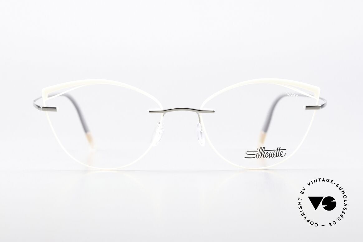 Silhouette 5518 Colored Pink Or Salmon, enchanting rimless eyeglasses with color accents, Made for Women