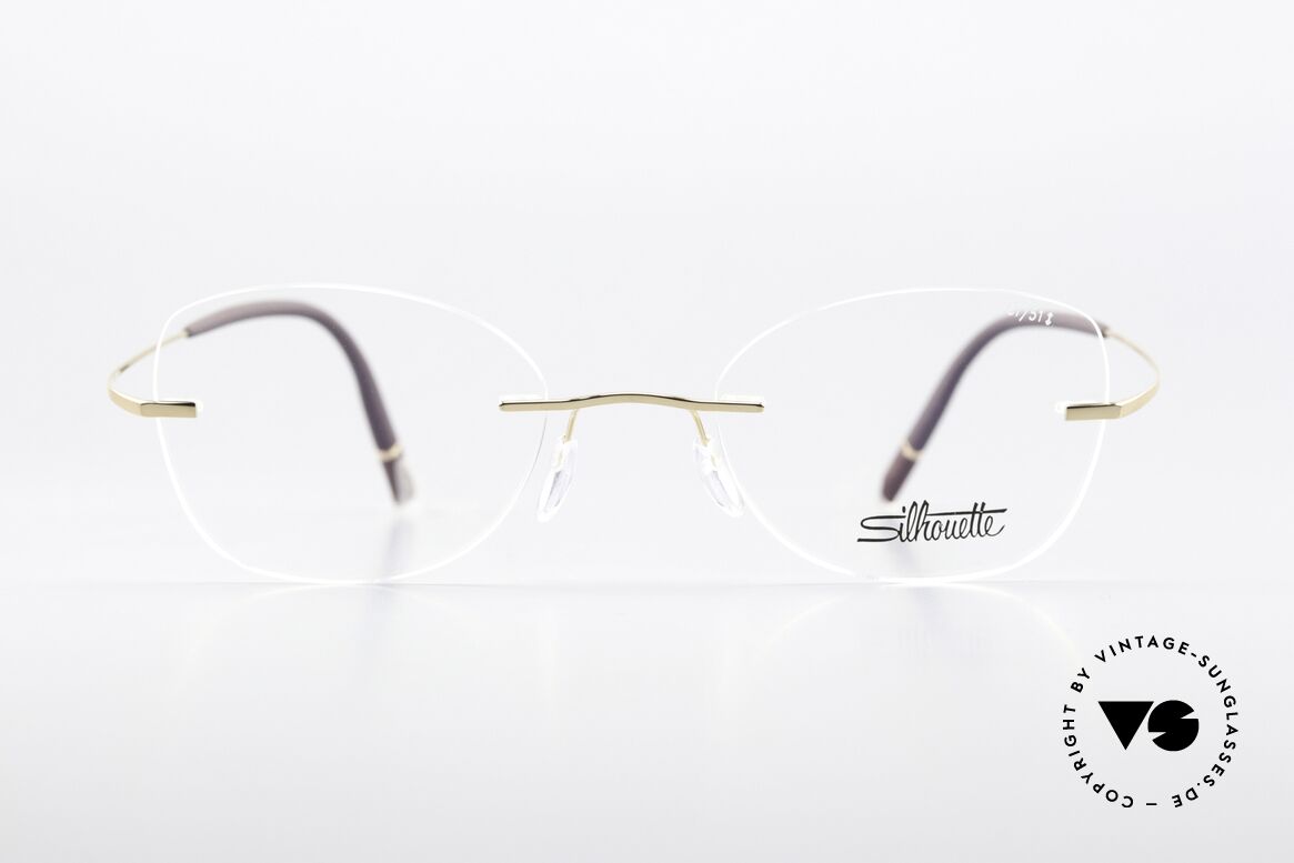 Silhouette 5541 Rimless Titanium Frame, design based on the 1999 Minimal Titan Art icon, Made for Women