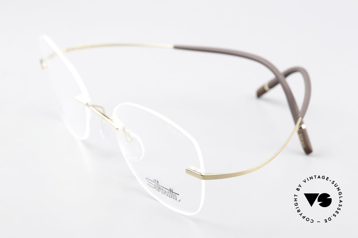 Silhouette 5541 Rimless Titanium Frame, here with very feminine demo lenses & gold plated, Made for Women