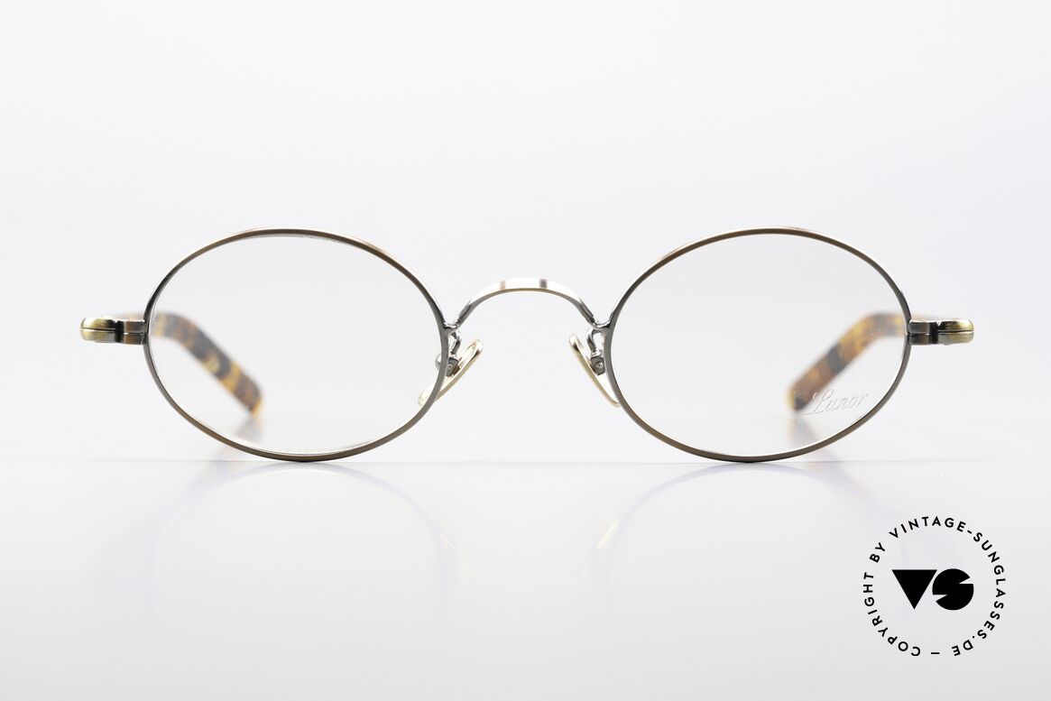 Lunor VA 100 Antique Gold And Bronze, oval stainless steel frame with acetate temples; unisex, Made for Men and Women