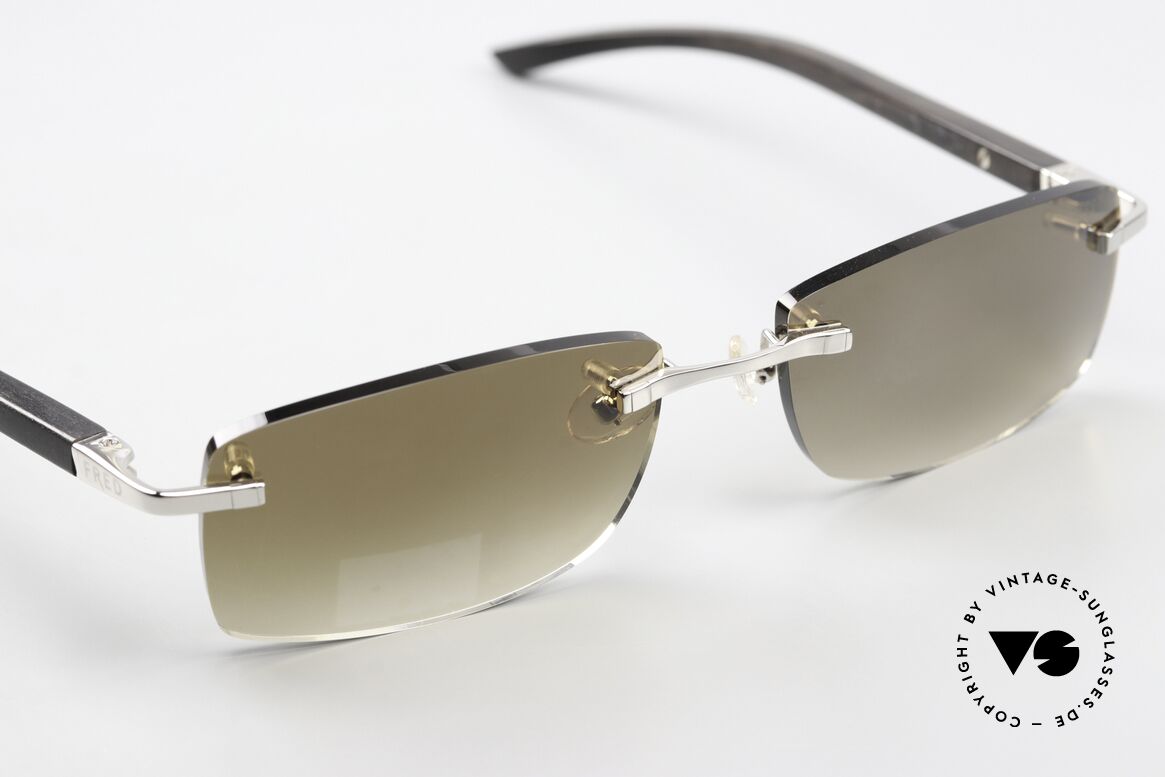 Fred Ellesmere F6 Rimless Sunglasses Wood, mini mark of the original price label on the right lens, Made for Men