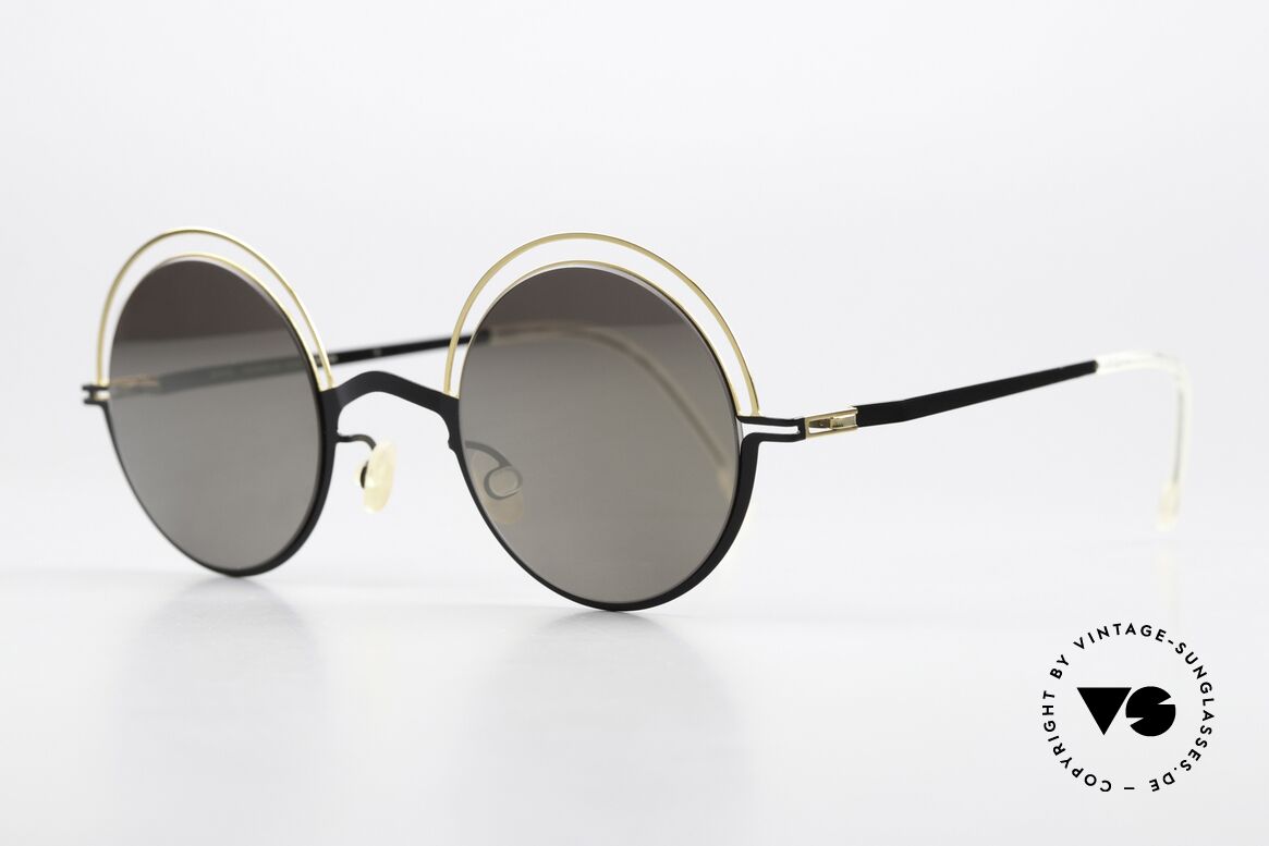 Mykita Bueno Round Designer Sunglasses, black/gold frame with slightly mirrored sun lenses, Made for Men and Women