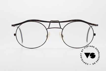 Cazal 1110 - Point 2 90's Industrial Eyeglasses, the frame recalls the 90's industrial / steampunk design, Made for Men