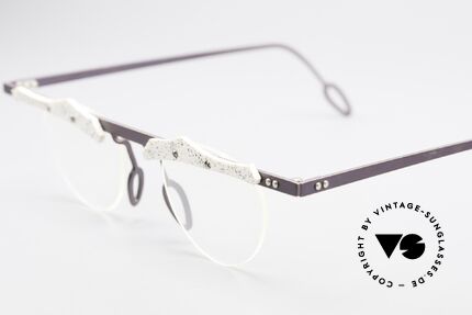 Theo Belgium Tita VII B4 Titanium Frame With Leather, the clear DEMO lenses are fixed with screws at the frame, Made for Women