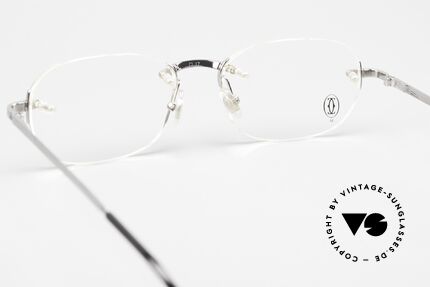 Cartier T-Eye Rimless Titanium Frame Rimless, lens size (gliding lens) can be changed if needed, Made for Men and Women