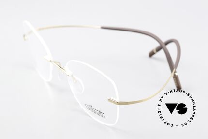 Silhouette 5541 Rimless Titanium Frame, here with very feminine demo lenses & gold plated, Made for Women