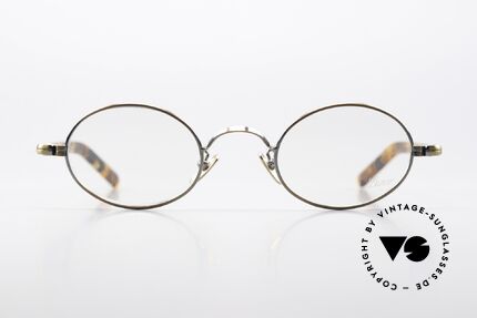 Lunor VA 100 Antique Gold And Bronze, oval stainless steel frame with acetate temples; unisex, Made for Men and Women