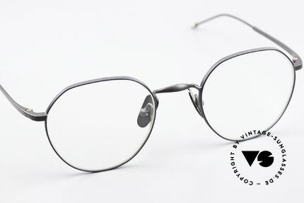 Thom Browne TBX914 Stylish Titanium Glasses, a classy designer accessory for all fashion lovers, Made for Men